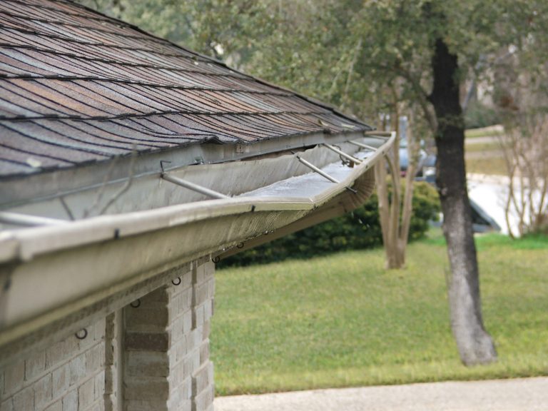 The Importance of Proper Gutter Slope: Preventing Water Damage