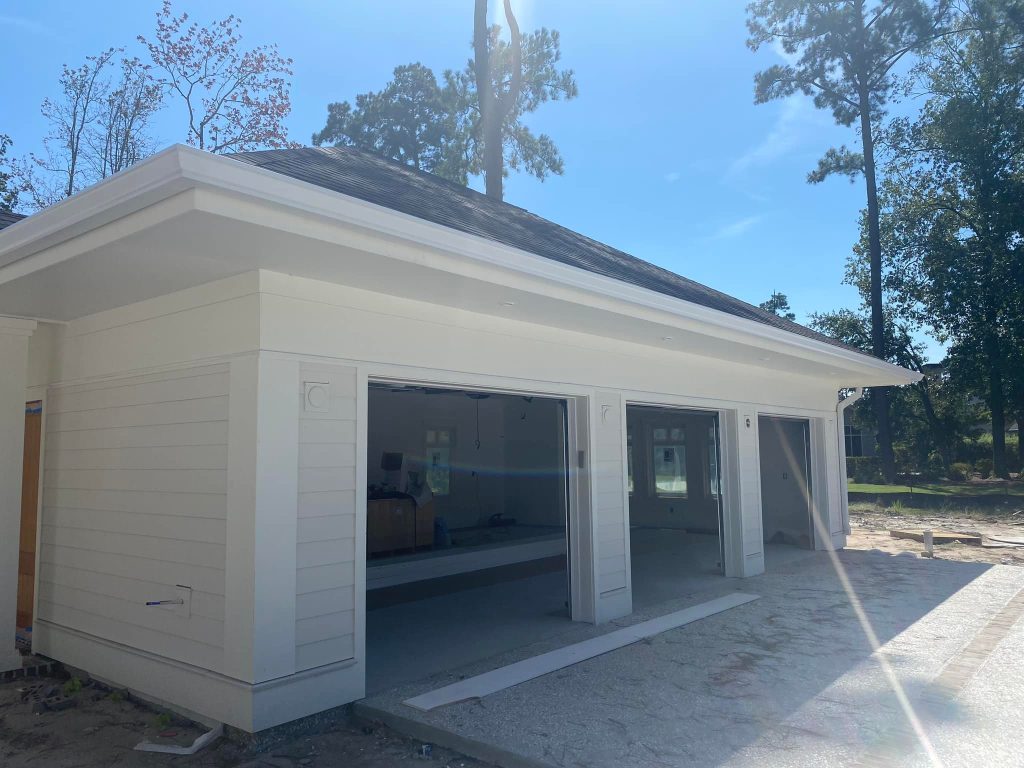 Custom seamless gutter installation in Bluffton SC on a residential roofline by GutterXperts